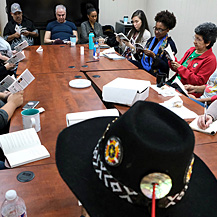 Tracy K. Smith reads and discusses poems from "American Journal" with a small gathering at the United Houma Nation Vocational Rehabilitation Office in Houma, LA. December 14, 2018. Credit: Kevin Rabalais.